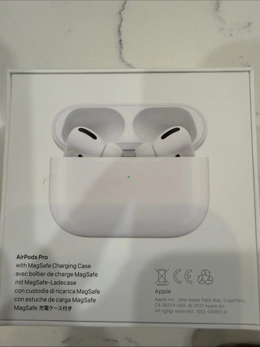 Apple AirPods Pro with MagSafe Charging Case + Kate Spade Black Silicone Case